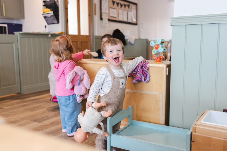 Kids playing in caterpillar room